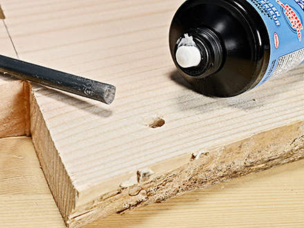 DIY side table step 6: glue the legs : For the last step, glue the metal legs into the holes using construction adhesive. Check the drying time for the adhesive before you stand the side table up; this may be up to 48 hours.