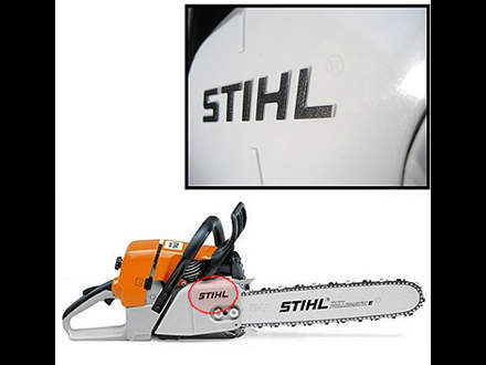: Embossed STIHL logo printed in black on the sprocket cover. STIHL never uses inferior stickers for the brand name or the model designations.